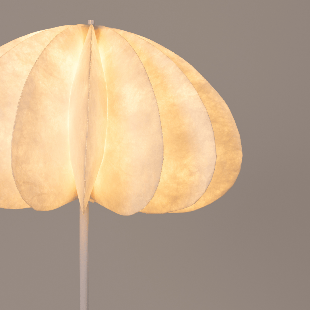 Floral-shaped Origami lampshade on a plain background