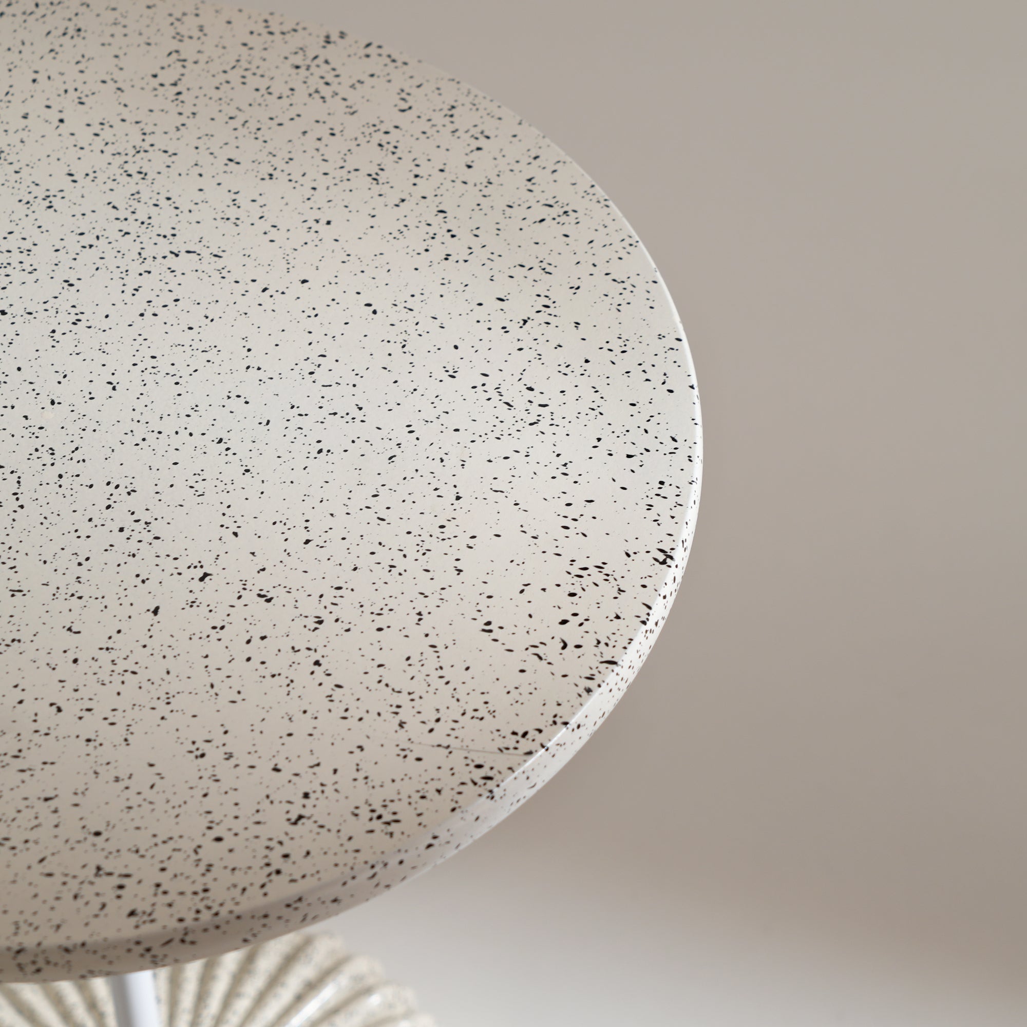 terrazzo-style off-white table