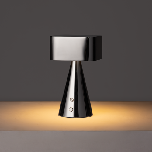 Illustration highlighting chrome portable lamp in stainless steel with modern minimalist design and soft ambient LED lighting