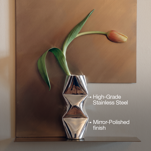 Small sculptural chrome vase for flowers
