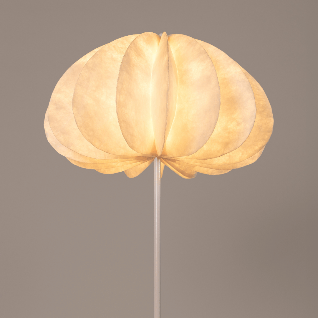 Daisy - Decorative floor lamp with a unique, layered shade on a plain background