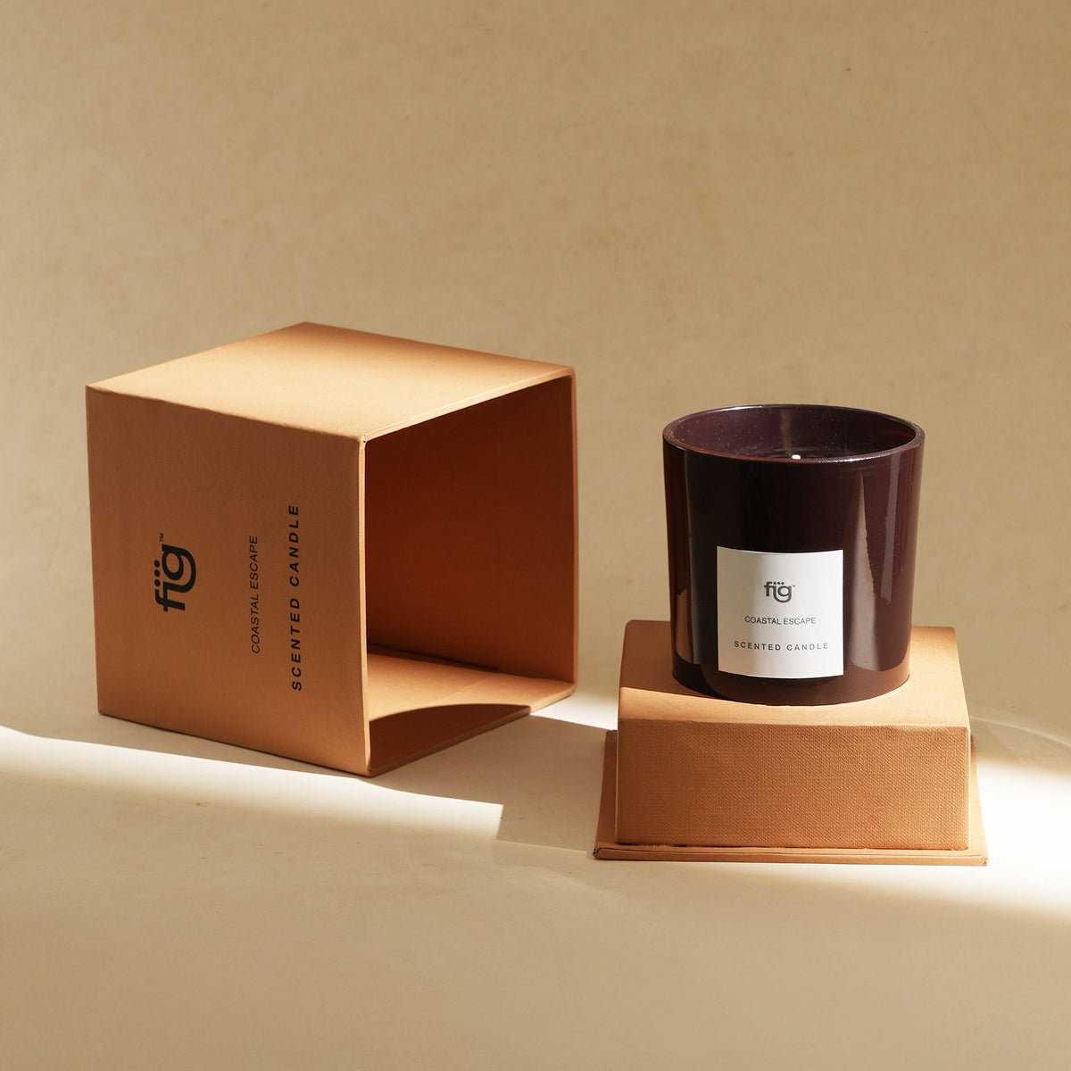 Wax candle with open box