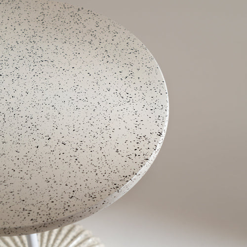 terrazzo-style off-white table