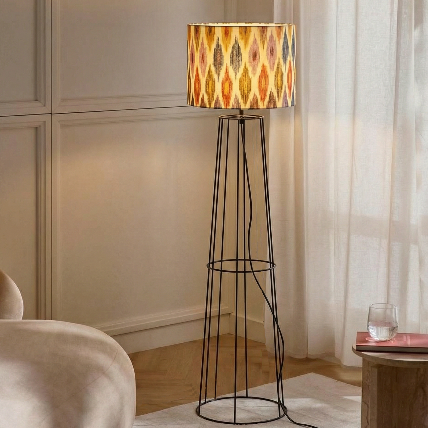Decorative floor lamp with a colorful shade in a room setting.