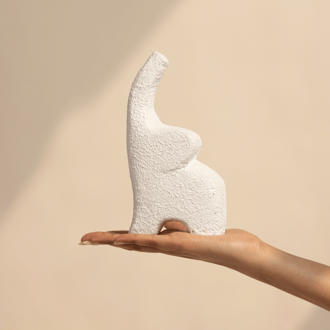 white elephant showpiece bookshelf styling