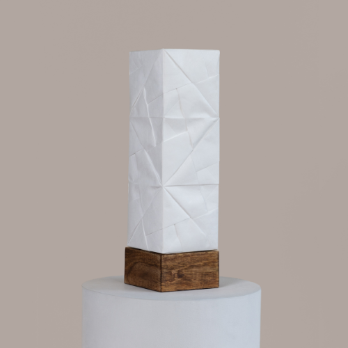 Solobe Tetris - Decorative Table lamp on a wooden base against a beige background