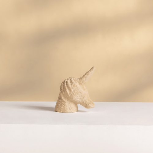 beige unicorn figurine home decor