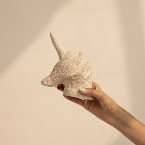 beige unicorn sculpture tabletop decor